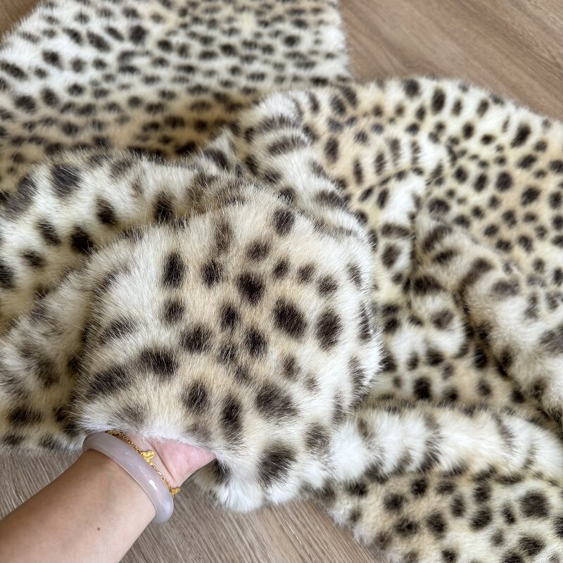 仿兽毛山猫豹纹毛绒布料人造毛皮草服装面料背景布地毯垫布