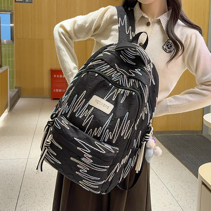 书包初中生2025新款高中女生高颜值小众ins风大容量简约双肩包女