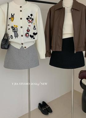 气质时尚显高显瘦A字百搭毛呢半身裙女辣妹黑色防走光包臀短裙子