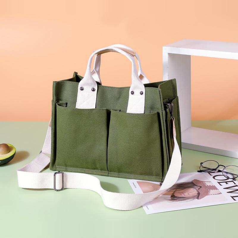 手提帆布包女原创韩版简约女包斜挎单肩大容量多兜学生书包公文包
