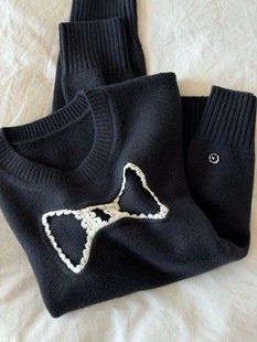 25秋冬蝴蝶结镂空刺绣镂空羊毛黑色毛衣