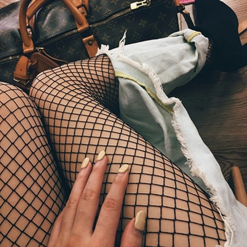 见男友tips通体辣妹风破洞渔网袜