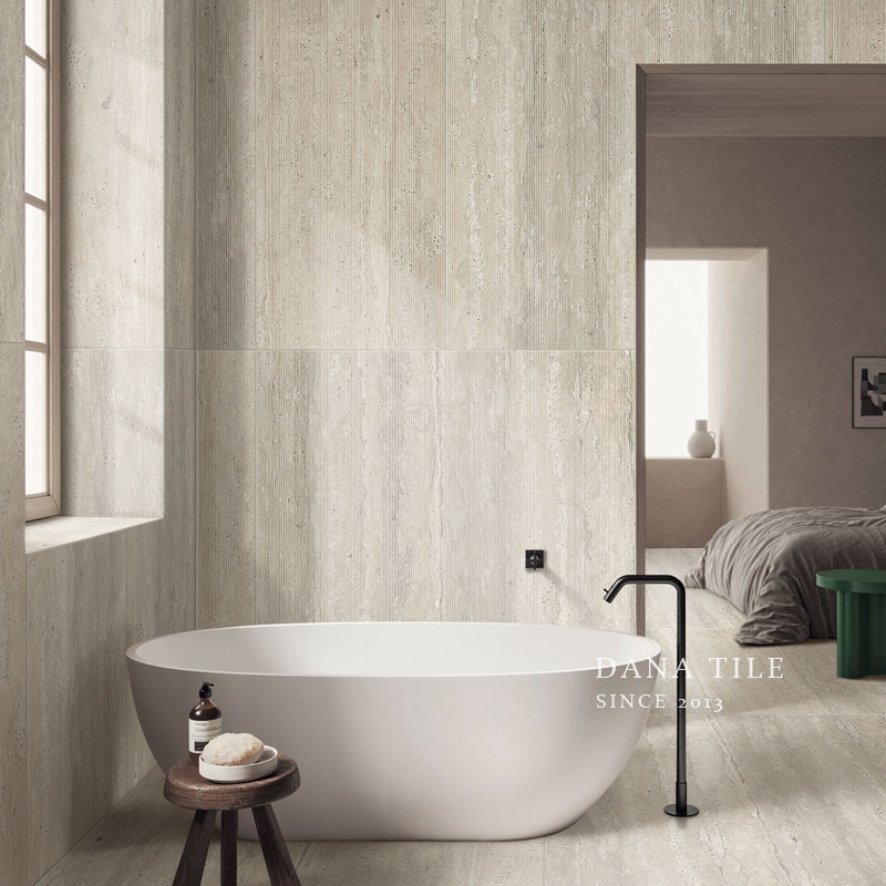 罗马洞石瓷砖侘寂风卫生间浴室墙砖地砖质感面易清洁全瓷仿古砖