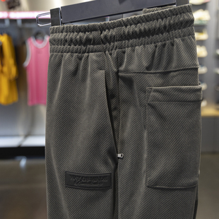 李宁长裤男款2024冬季新款韦德梭织宽松条绒束脚运动裤子AKXU085