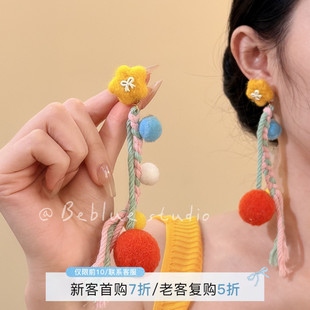 惬意假日~秋冬夸张彩色星星毛线绒球耳环2026新款复古民族风耳饰