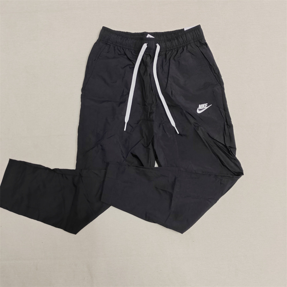 耐克NIKE正品男梭织运动休闲春秋薄款窄管小裤脚长裤FB7407-010