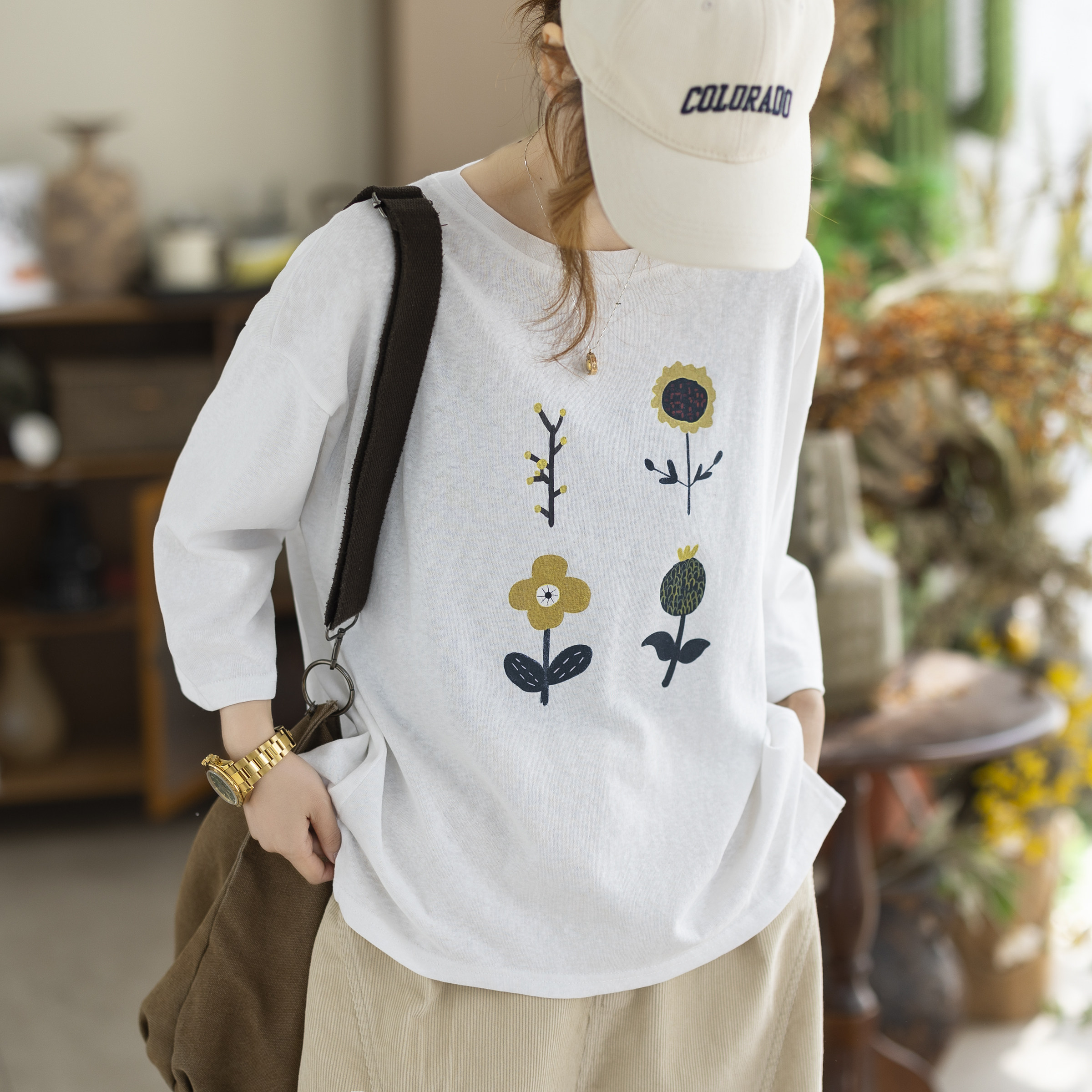 咖咪羽春季新款深蓝色印花宽松长袖T恤女复古文艺风休闲百搭上衣