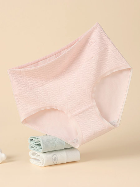 Pastel pink women's seamless underwear displayed on a plain background