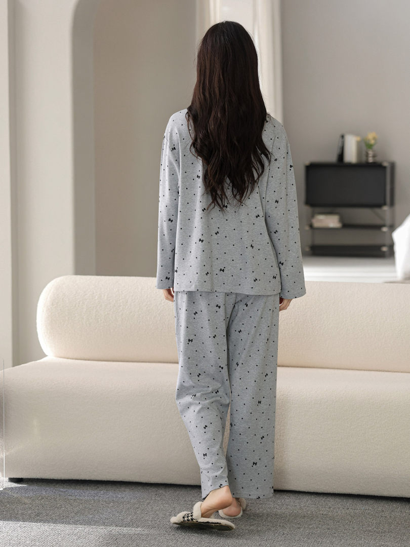 Model wearing a gray patterned long-sleeve pajama set