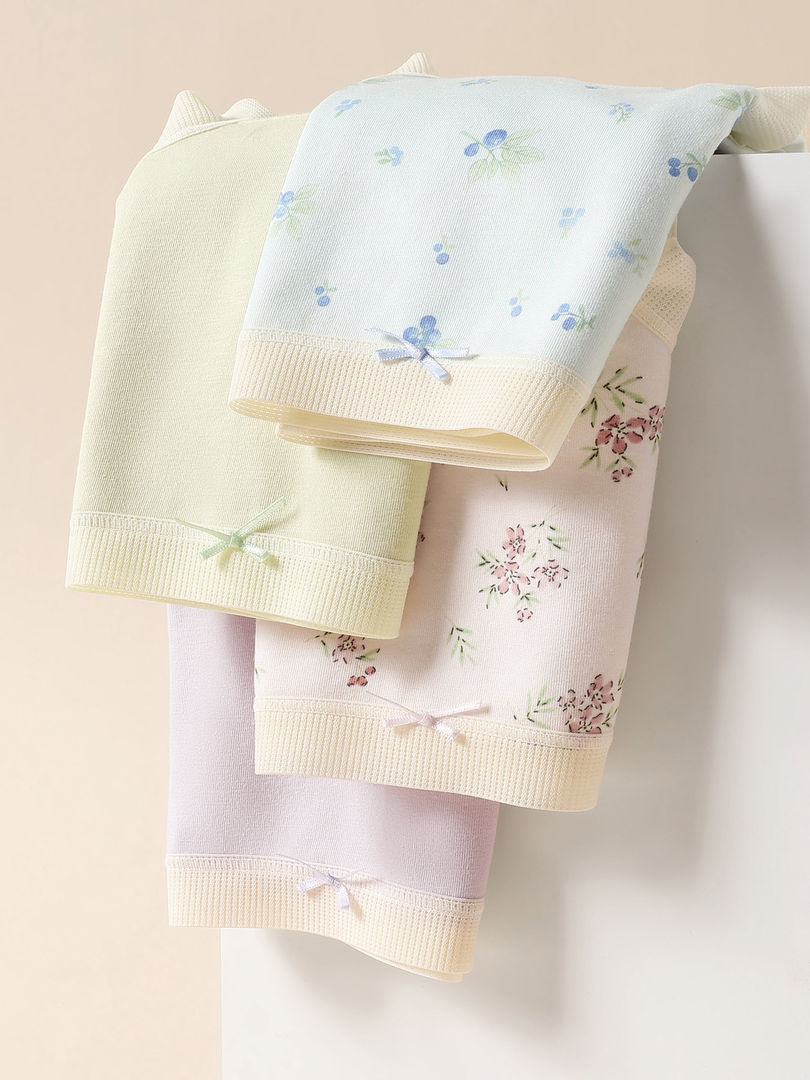 Pastel floral underwear or loungewear bottoms displayed hanging on a rack