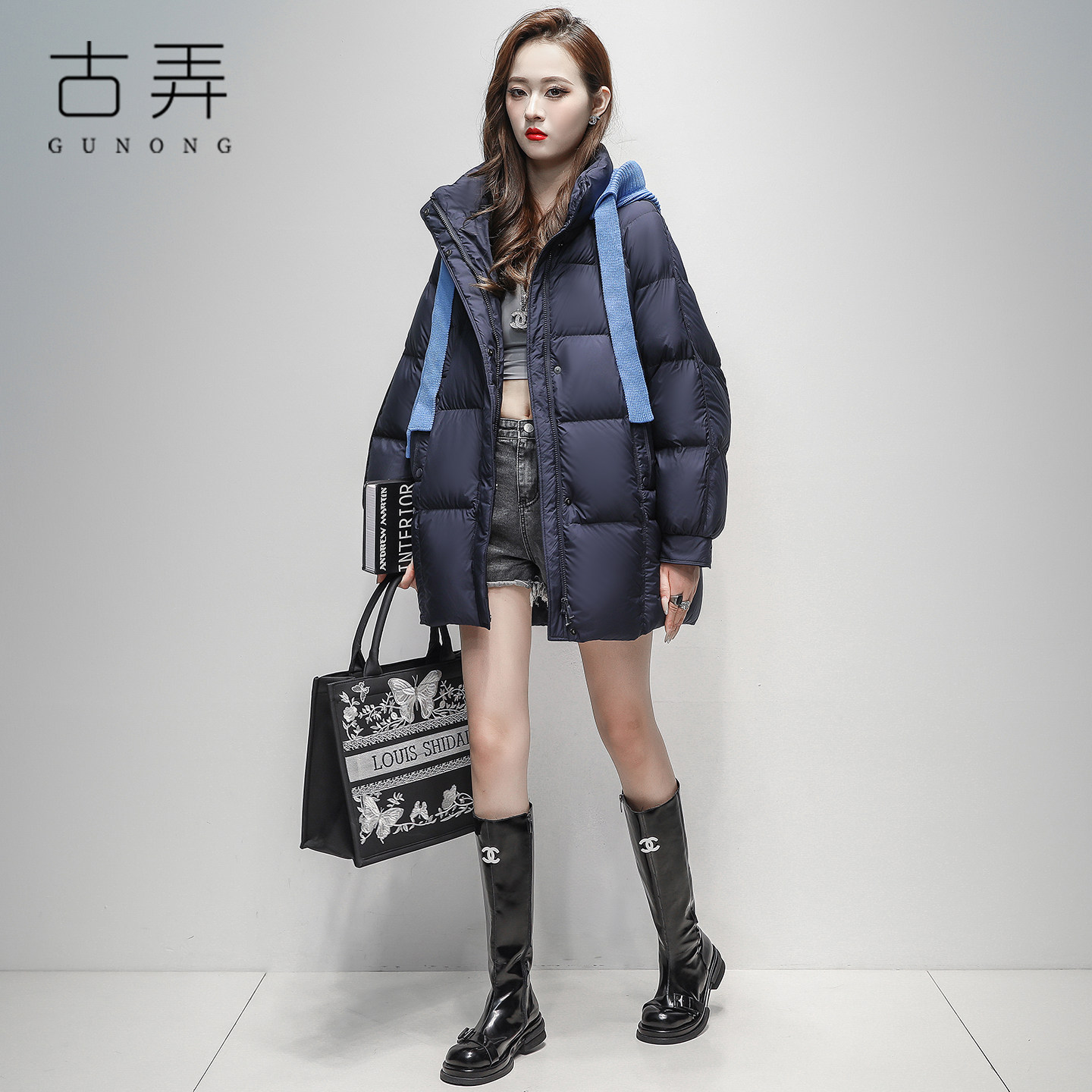 时尚大牌中长茧型羽绒服女2025冬季新款百搭可拆卸针织帽外套潮