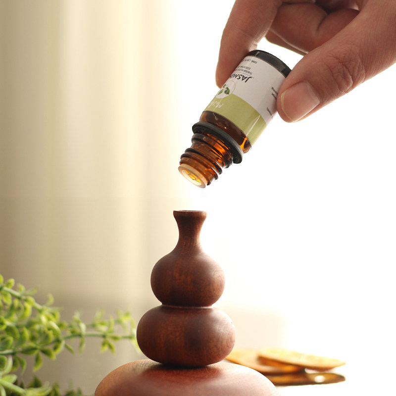 车载平安葫芦精油扩香木扩香石香水香薰卧室内汽车载出风口扩香木