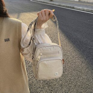 超轻便尼龙布包女休闲大容量斜挎包2026新款多层旅游单肩包手机包