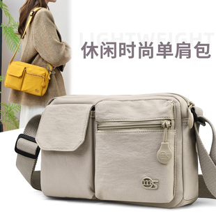 多口袋斜挎包女2026新款日常通勤帆布包防水单肩轻便百搭小方包