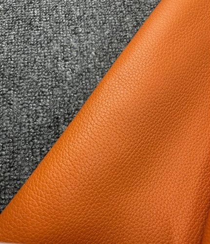 阳光皮料 进口头层橙色togo纹 手感略挺 厚度2.5mm左右