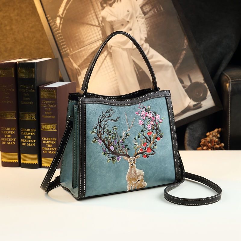 女包水桶包秋冬拼色女包2025新款包包挂件高级感斜挎包