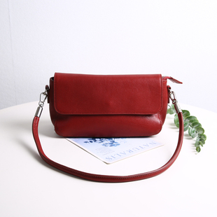红色真皮女包高级感腋下包头层牛皮单肩斜挎包通勤包三角包婚礼包