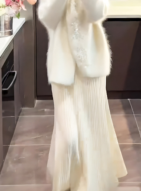 优雅气质温柔风奶白色坑条针织半身裙女秋冬新款垂坠感中长款裙子