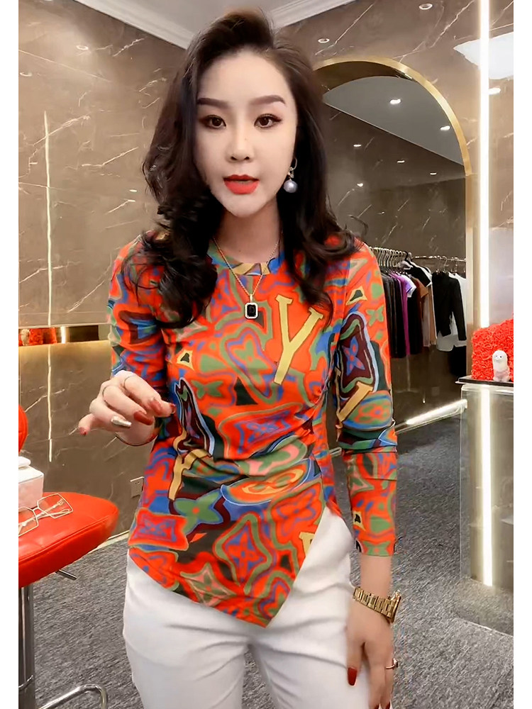 2023小众不规则设计橘色长袖时尚上衣早春新款洋气印花T恤上衣女