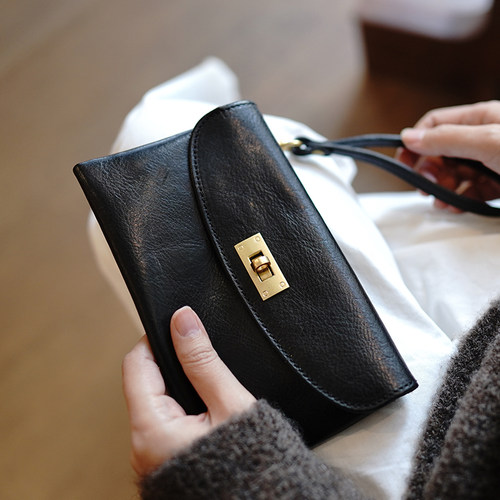 鹿小姐植鞣牛皮复古手拿包