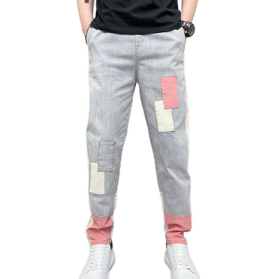 新款春秋男小脚休闲牛仔九分裤网红同款束脚低档哈伦裤贴布乞丐裤