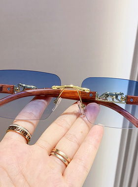 新款猎豹装饰木纹无框太阳镜渐变色眼镜男女复古豹子头金属墨镜