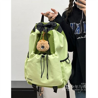 户外徒步包女抽绳束口拼色防泼水登山背包高颜值羽毛球包男电脑包