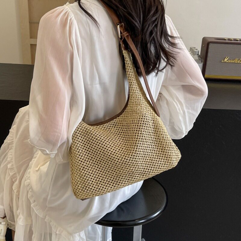 日本ぜいた编织草编包包女大容量2026新款夏天百搭镂空单肩包海边