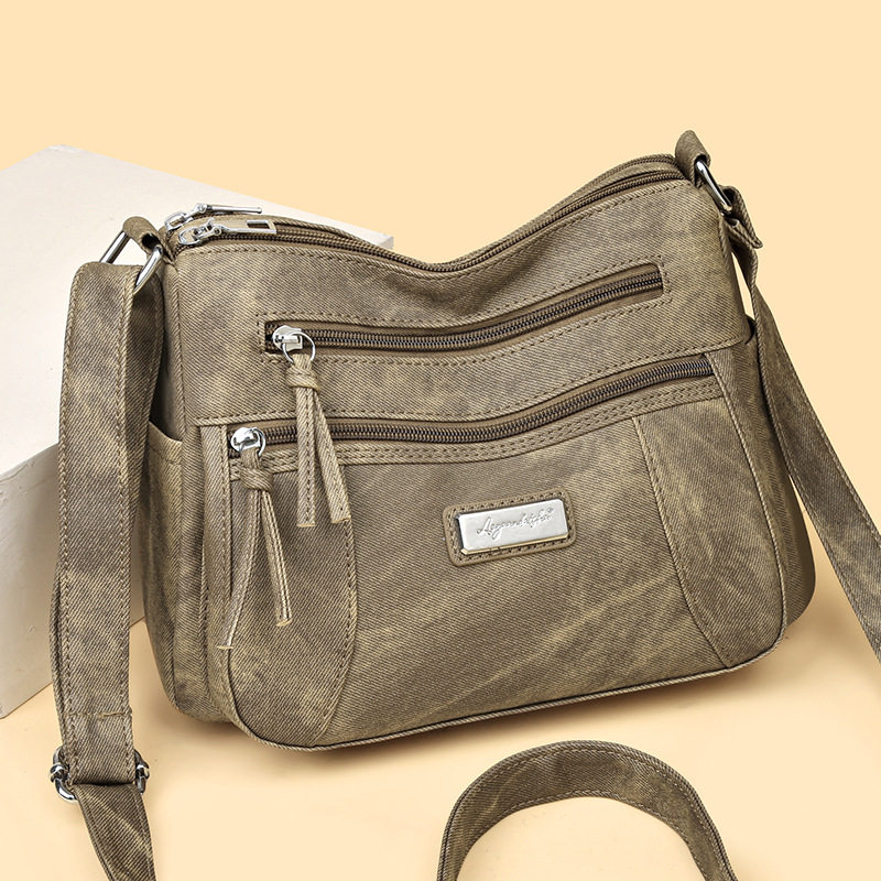 日本ぜいた马鞍包大容量斜挎包女包2026新款中年妈妈百搭时尚软皮