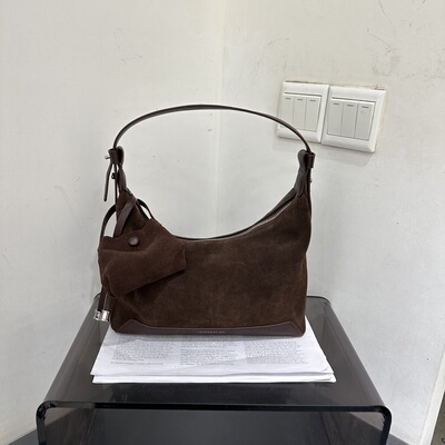 劳拉时黛复古磨砂皮休闲大容量韩版手提水桶包单肩斜挎百搭月牙包