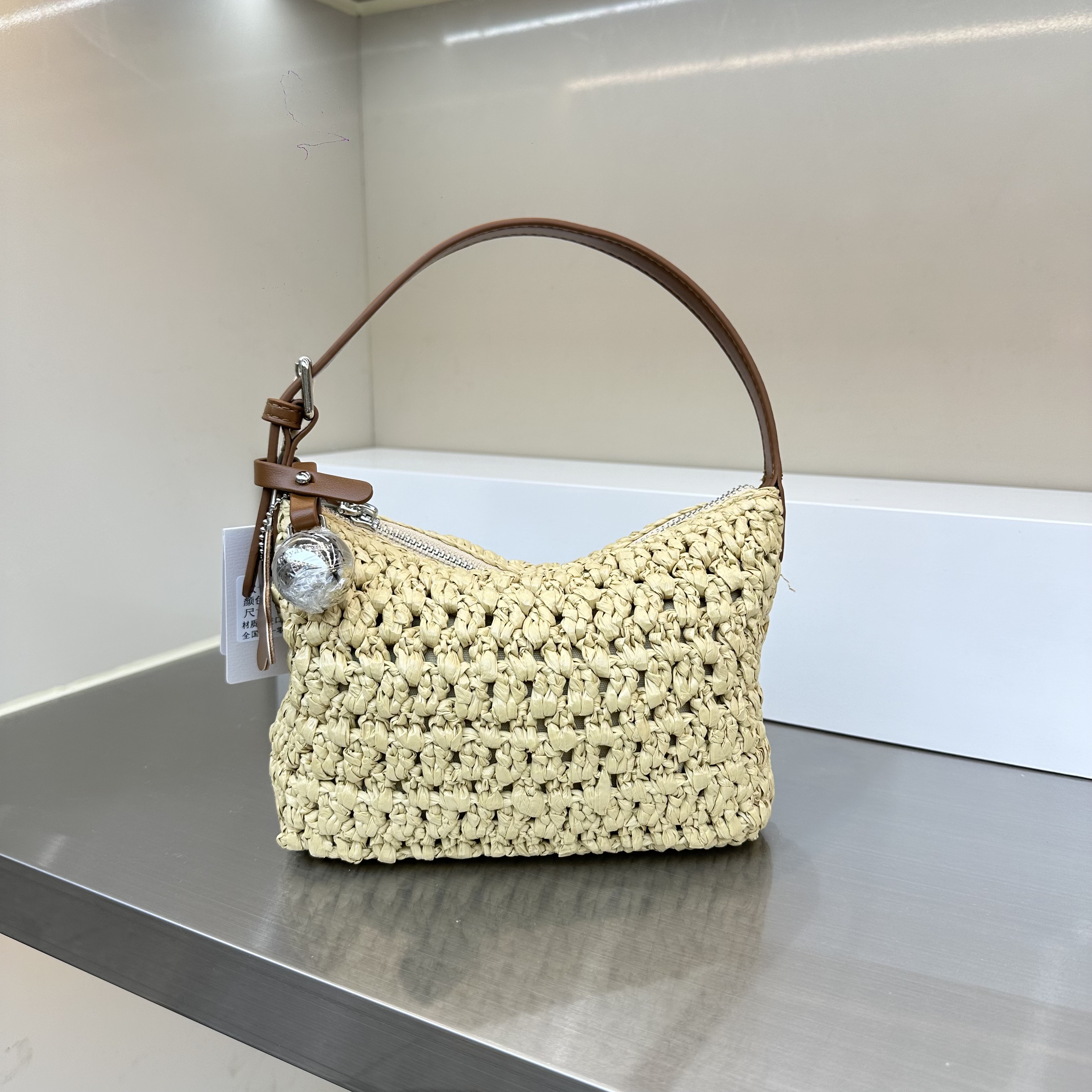 夏季新款时尚拉菲草编织女包手提斜挎多用包百搭休闲洋气小众轻便