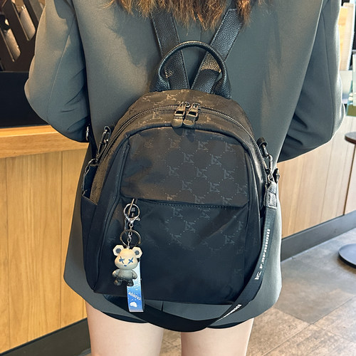 高颜值小众风印花轻便双肩包女
