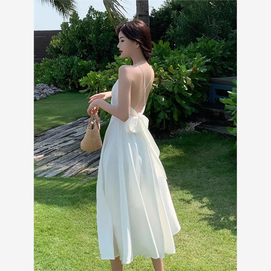 碎花吊带连衣裙女拍照衣服海边巴厘岛三亚沙滩裙性感露背度假长裙