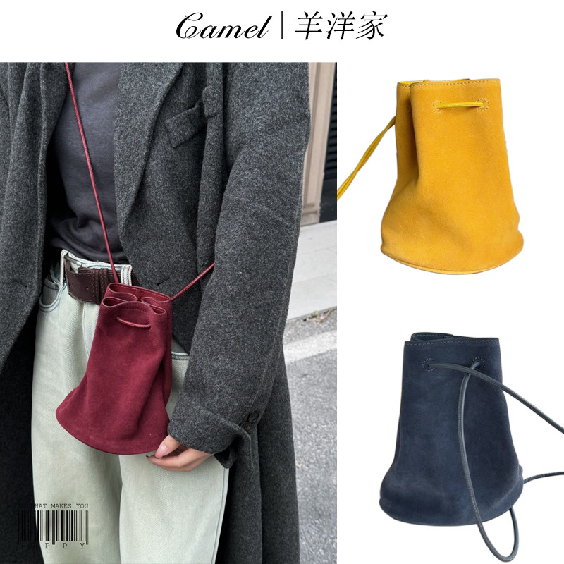 真皮头层牛皮小众抽绳水桶包女2025新款秋冬单肩包斜挎包小圆桶包