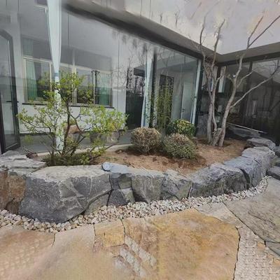 中国黑景观石树池围柏庭院池坡黄地铺石中国黑置石曲阳厂家