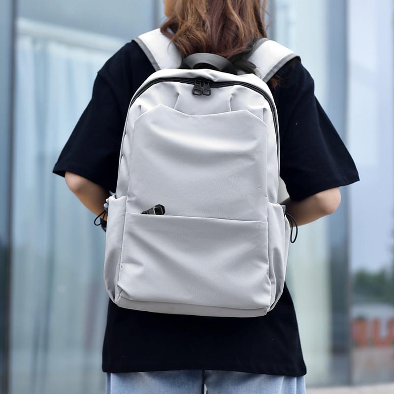 简约森系大容量纯色双肩包女韩版百搭书包男高中背包女双肩大学生