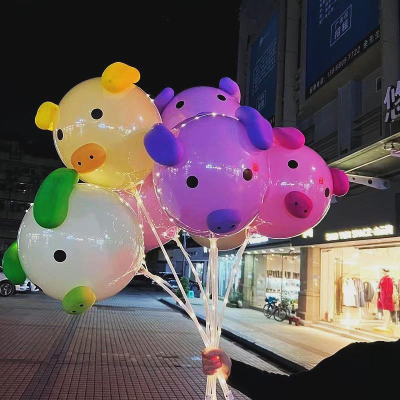 网红猪猪气球摆地摊礼品卡通新款材料包发光夜市幼儿园地推波波球