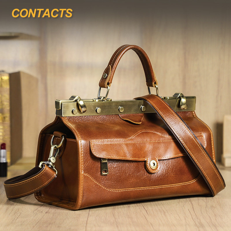 黑天使全粒面树羔牛皮多隔层女士手提包高端五金锁真皮女式斜挎包