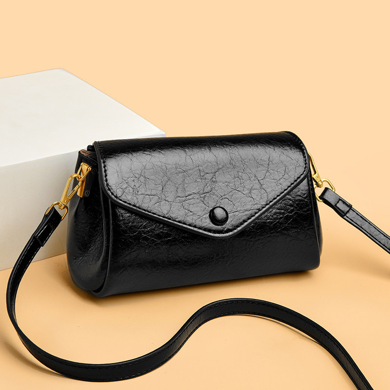 骞诺贝儿真皮质感女单肩斜挎包时尚百搭大容量黑色小包