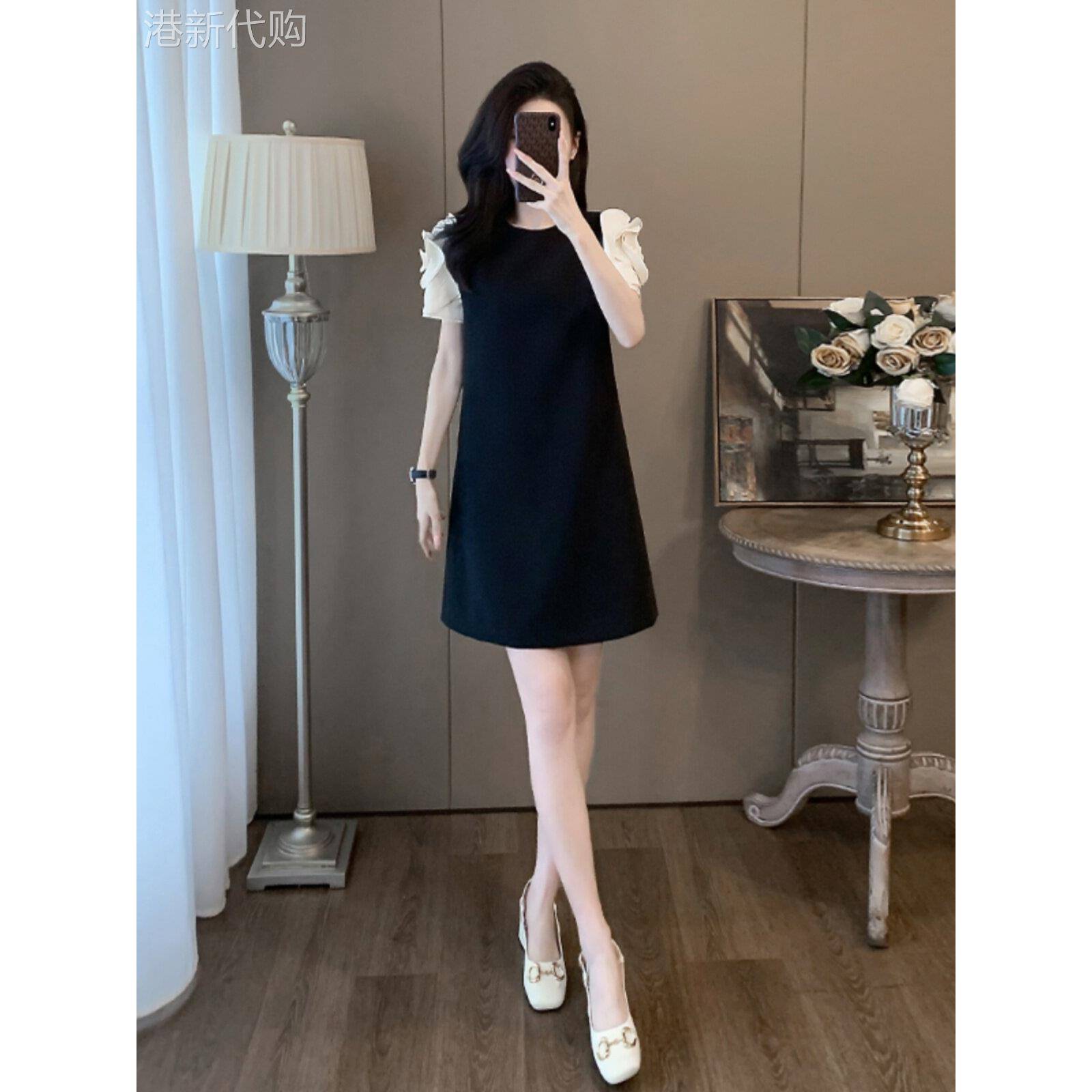 黑色休闲洋装女2026新款夏季宽松显瘦气质高级感遮肉a字短裙子