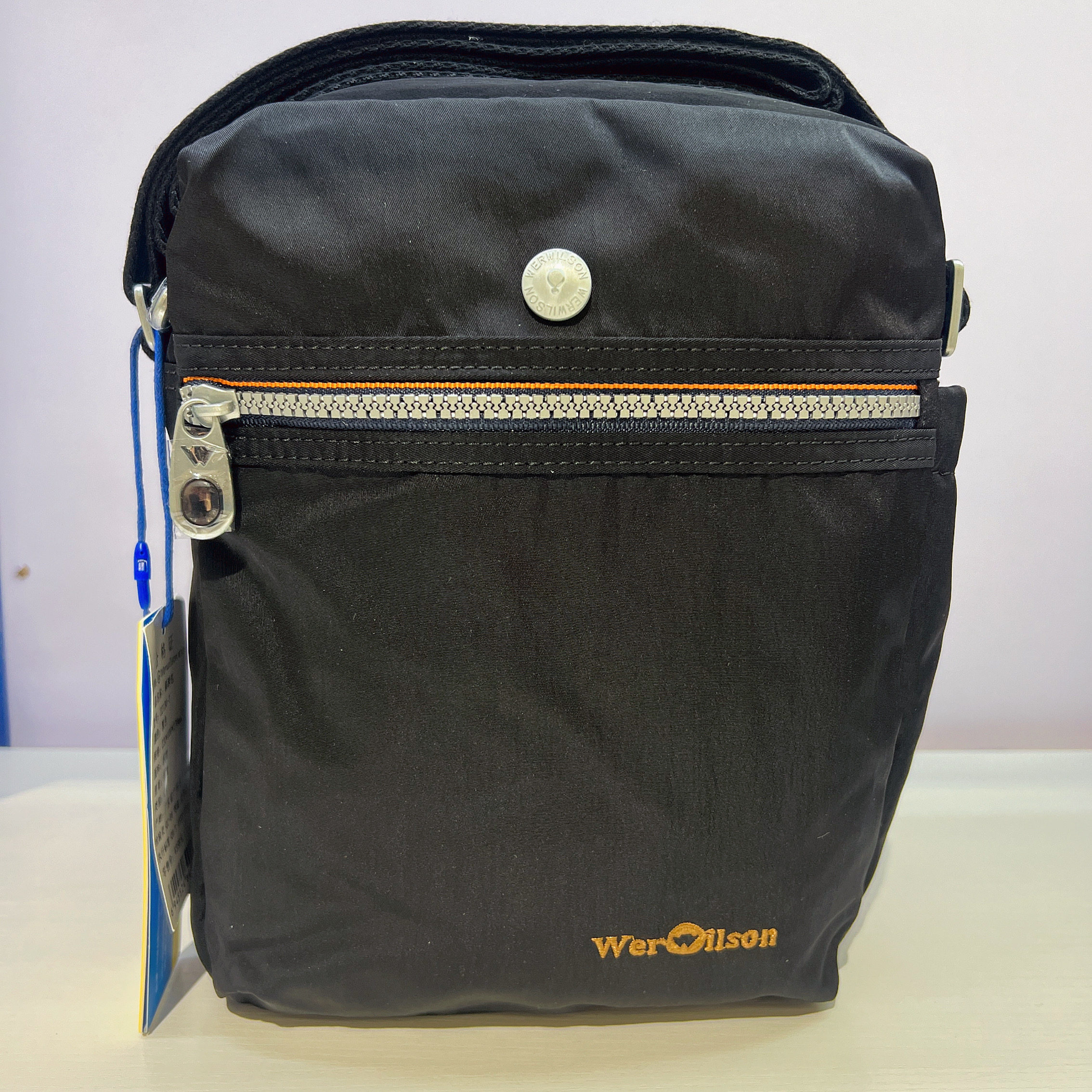 威尔逊男包单肩包多拉链隔层斜挎包大容量防水休闲包竖版