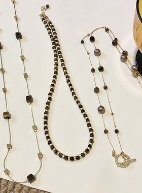 美拉德虎眼石珍珠项链女秋冬季2025爆款百搭轻奢高级感长款毛衣链