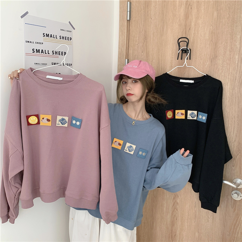 A new embroidered sweater with round neck in spring