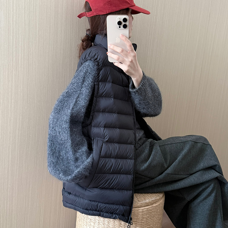 话里精致叠穿长款羽绒马甲