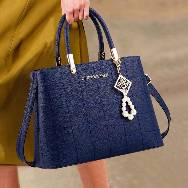 香港真皮女士包包2026新款时尚手提女包百搭中年妈妈包单肩斜挎包