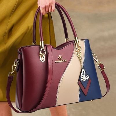 香港真皮2025新款撞色手提包大容量软皮妈妈包中年单肩包通勤包