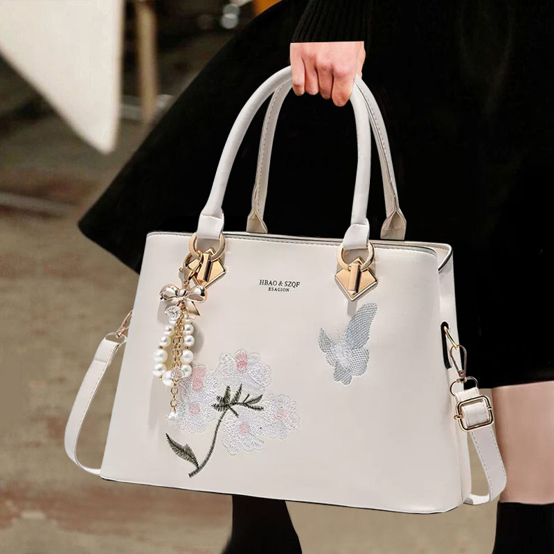 香港真皮女士妈妈包女新款韩版春夏手提百搭单肩斜挎包时尚手提包