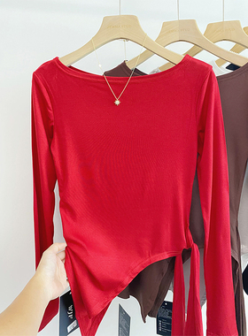 韩系辣妹红色一字肩长袖t恤女2025秋季新款不规则系带打底衫上衣