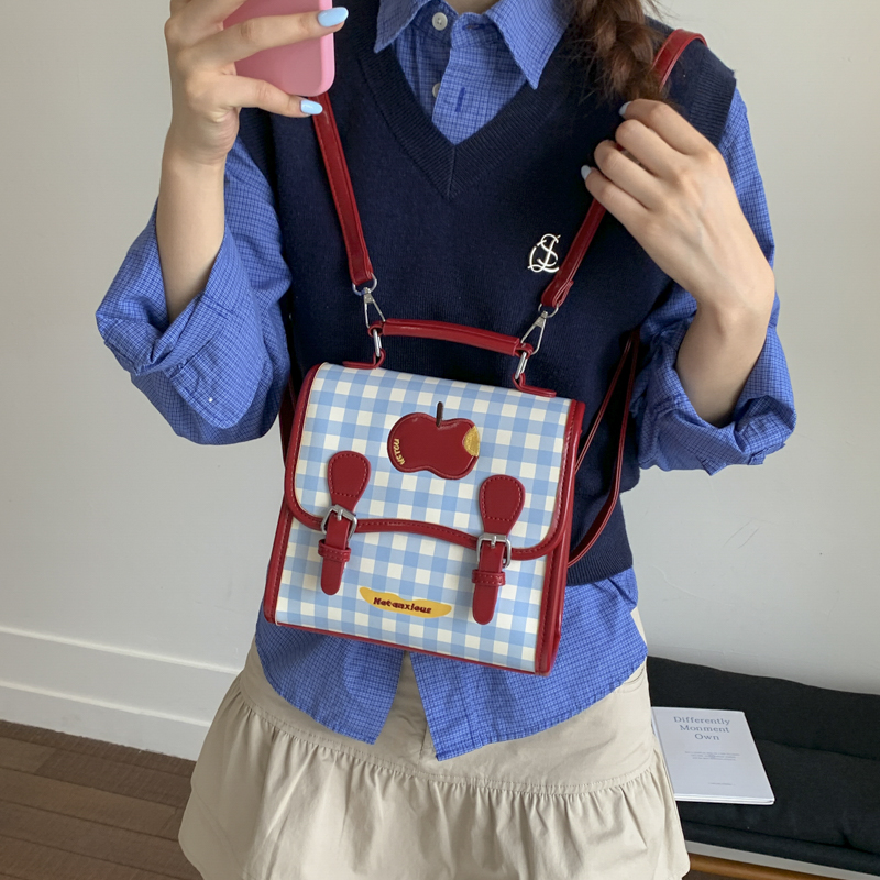 红色双肩包女2025新款可爱卡通小众设计通勤包学生党韩系小背包潮