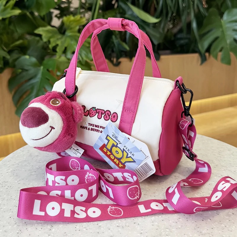 迪士尼蜂蜜罐草莓熊毛绒公仔抱抱斜挎手机包草莓熊平安喜乐斜挎包